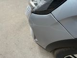a close up of a car ' s front bumper