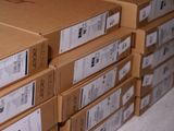several boxes stacked on top of each other on a floor