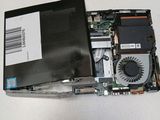 a laptop that has a fan on top of it