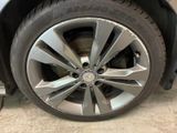 a close up of a tire on a car ' s rim
