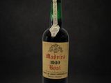 a bottle of wine with a cork on top of it