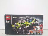 a box of lego technic toys sitting on a table