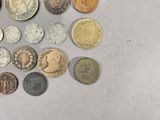 a lot of coins that are on the table