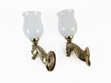 pair of brass horse head wall sconces with frosted glass shades