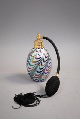 an image of a perfume bottle with a headphone attached