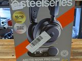 a box of headphones sitting on a wooden table