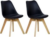 paire de chaises de salle à manger en cuir noir avec des pieds en bois