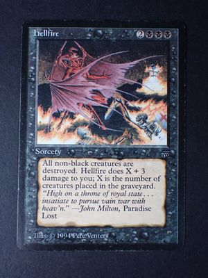 a close up of a card with a picture of a demon on it