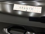 a sticker that says vauto on the back of a car