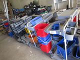 many buckets that are sitting on a cart in the garage
