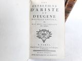a book that is open on a white surface