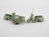 a toy truck and a toy scooter sitting next to each other