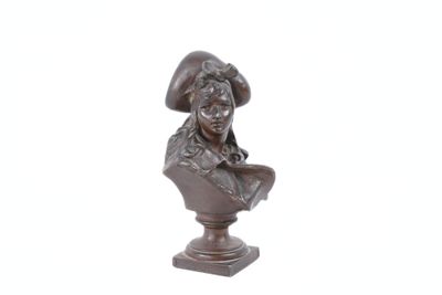 bronze bust of a woman with a hat on a pedestal