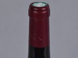 a bottle of wine that is sitting on a table