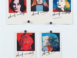 four pictures of a woman with different colored hair are hanging on a wall
