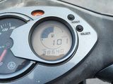 a close up of a speedometer on a motorcycle