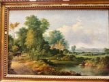 une image d'un tableau sur le mur d'une pièce