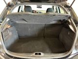 a trunk of a car with the back seat folded down