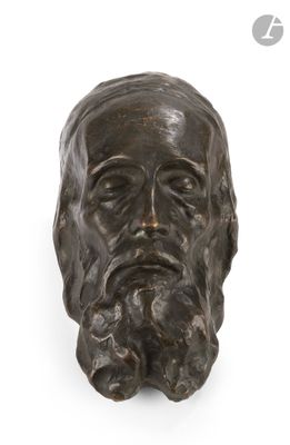 the head of a statue of a man with a beard