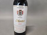 a bottle of wine that is sitting on a table