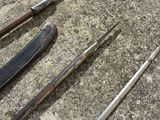 a lot of tools that are laying out on the ground