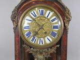a clock that is sitting on top of a table