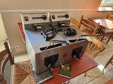 an image of a kitchen with a stove and a table