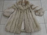a picture of a fur coat on a tile floor