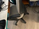 a desk with a computer and a monitor on it