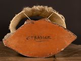 a red brick with the word trader written on it