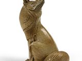 une image représentant une statue de chat sur fond blanc