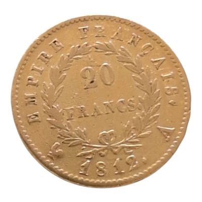 une image représentant une pièce d'or sur laquelle figure le chiffre vingt