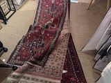 a long rug on the floor in a room