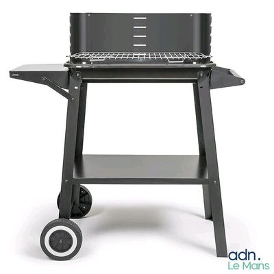 an image of a grill with a laptop on it