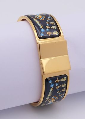 bracelet plaqué or avec émail noir et bleu et fermoir plaqué or