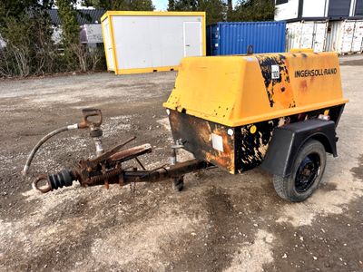 a small machine that is sitting in the dirt