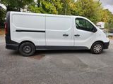 a white van that is parked in a parking lot