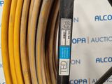 a close up of a hose on a rack with a label on it