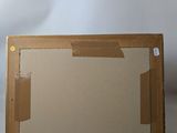 a picture of a picture of a picture in a cardboard box
