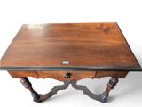 a small wooden table with a drawer on top of it