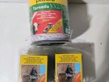 two packages of pet supplies sitting on a table