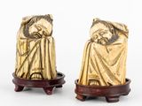 paire de figurines chinoises en ivoire sculpté représentant un homme et une femme