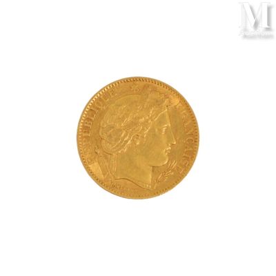 l'image d'une pièce d'or sur laquelle figure une tête de femme