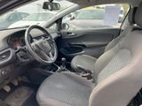the interior of a car with a steering wheel and a dashboard