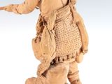 a statue of a man with a bag on his back