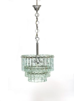 an image of a glass chandelier hanging from a ceiling