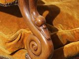 a chair that is sitting on the street