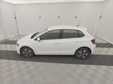 the white car is parked in the garage on the checkered floor