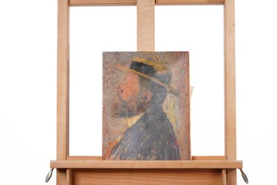 a painting of a man with a hat on a easel