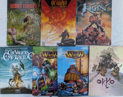 un grand nombre de livres posés sur une table